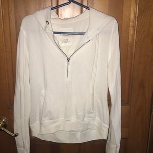 white coverup or sweatshirt